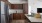 a kitchen with wooden cabinets